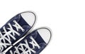 Clothes, shoes and accessories - top view fragment pair blue gumshoes isolated Royalty Free Stock Photo