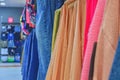 Clothes shop Costume dress. Fashion store. Style Concept. Colorful women`s dresses on hangers in a retail shop. Fashion and shopp Royalty Free Stock Photo