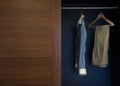 Clothes in wardrobe wood Royalty Free Stock Photo