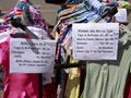 Clothes at yard sale Royalty Free Stock Photo