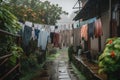 a clothesline with wet and windblown clothes in the rain Royalty Free Stock Photo