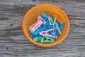 Clothespin clips in a basket. Royalty Free Stock Photo