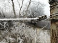 clothespin in the ice on the street. Clothing clothespin in frost on a clothesline outside in winter. in winter, the Royalty Free Stock Photo