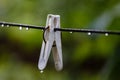 Clothespin with rain drops Royalty Free Stock Photo