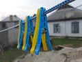Clothespins blue-yellow, Ukraine, village, rural hut