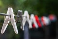 Clothespins on blur nature background close up Royalty Free Stock Photo