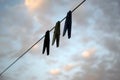 Clothespins hanging on a wire Royalty Free Stock Photo