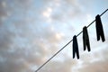 Clothespins hanging on a wire Royalty Free Stock Photo