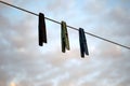 Clothespins hanging on a wire Royalty Free Stock Photo