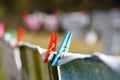 Clothespins holding laundry on the drying line Royalty Free Stock Photo