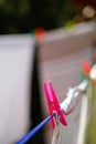 Clothespins holding laundry on the drying line Royalty Free Stock Photo