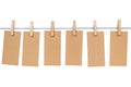 Clothespins and notepads over white Royalty Free Stock Photo