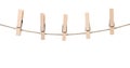 Clothespins on a rope on a white background. Isolated Royalty Free Stock Photo