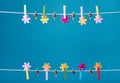 Clothespins thread spring backround. High resolution photo. Royalty Free Stock Photo