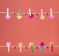 Clothespins thread spring backround. High resolution photo. Royalty Free Stock Photo