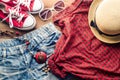 Clothing and accessories for women with summer on wood floor. Royalty Free Stock Photo