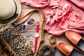 Clothing and accessories for women on wood floor. Royalty Free Stock Photo
