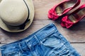 Clothing and accessories for women on wood floor - life style Royalty Free Stock Photo