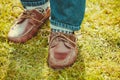 Male footwear in grass. Royalty Free Stock Photo