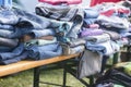 clothing collection like jeans, shirts and sweaters for the indigent or for sale at a flea market Royalty Free Stock Photo