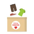 Clothing donation banner. Various old clothes drop into cardboard box. Charity donation concept, second hand things