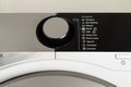 Clothing dryer control panel with knob and power button. Wool drying program displaying Royalty Free Stock Photo