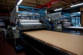 Clothing factory - Automatically cutting textile Royalty Free Stock Photo