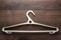 Clothing hanger on brown table Royalty Free Stock Photo