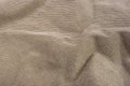 clothing items stonewashed cotton fabric texture with seams, clasps, buttons and rivets, macro