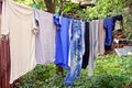 Clothing and linen dries after washing in the yard Royalty Free Stock Photo