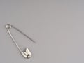 Clothing pin on a gray background closeup. Space for text Royalty Free Stock Photo