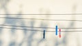 Clothing pins hanging on washing lines Royalty Free Stock Photo