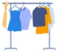 Clothing rack with hanging dress. Fashion store wardrobe