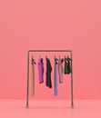 Clothing rack on pastel color background