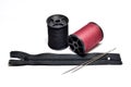 The clothing repair kit consists of black and dark red thread Royalty Free Stock Photo