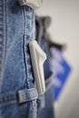 Clothing security tag on a jeans , Royalty Free Stock Photo