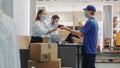 Clothing Store Checkout Counter: Retail Sales Managers wearing Protective Face Masks Give Package to