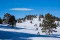 Cloud above snowy mountain hills