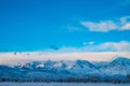 Cloud bank above snowy Sierra Nevada mountain range