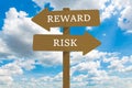 Reward and risk on road sign.