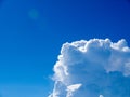 Cloud on blue sky with little flare Royalty Free Stock Photo