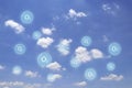 Cloud and blue sky with oxygen symbols floating around.