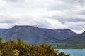 Cloud-capped peaks on the shores of Lake Wakatipu. New Zealand