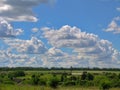 Cloud cascade against the blue sky