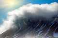 Cloud caught on the glacial sheet, nunatak in fog Royalty Free Stock Photo