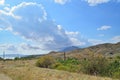 The cloud comes up from behind the mountains in the Karadag National nature reserve Royalty Free Stock Photo