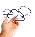 Cloud computing concept. Hand and clouds Royalty Free Stock Photo