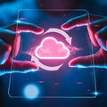 Cloud computing concept with hand holding glowing cloud icon Royalty Free Stock Photo
