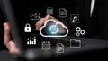 Cloud Computing Concept with Hands on Laptop, Data Transfer Icons, Digital Storage, Security, Files, Multimedia, and Royalty Free Stock Photo