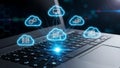 Cloud Computing Laptop Network. Digital data management technology with futuristic blue glow. Royalty Free Stock Photo